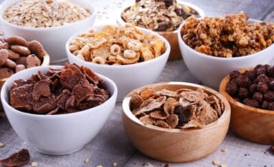 Bowls with different sorts of breakfast cereal products